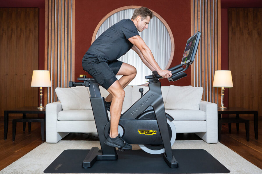 Kempinski Hotels have introduced a new room category. Fit Rooms are equipped with a Technogym Bike and Technogym Case. Photo here shows guest on Technogym Bike. Photo provided by Technogym.