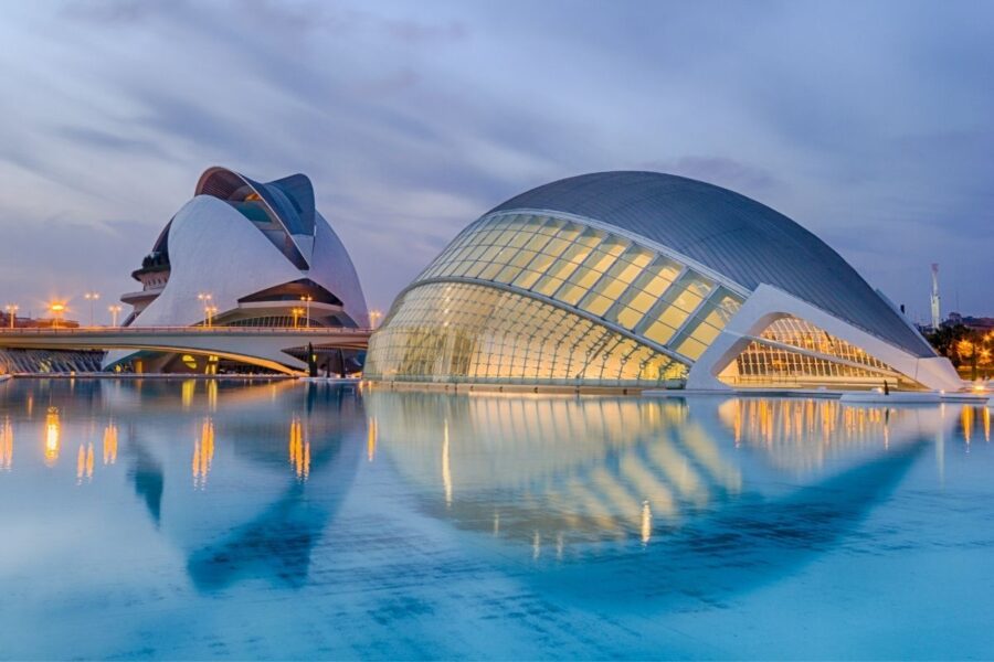 Valencia's City of Arts and Science is an ultra-modern six building complex constructed in the former bed of the River Turia. Image here shows two of the buildings. Photo is by papagnoc | Canva.