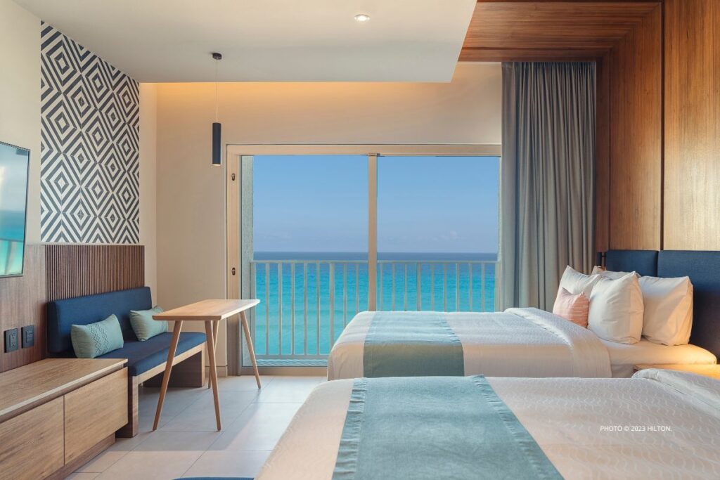 This is an image of a double guestroom at the Hilton Cancun Mar Caribe All-Inclusive Resort, opening in Cancun, Mexico in November 2023. Photo © 2023 Hilton.