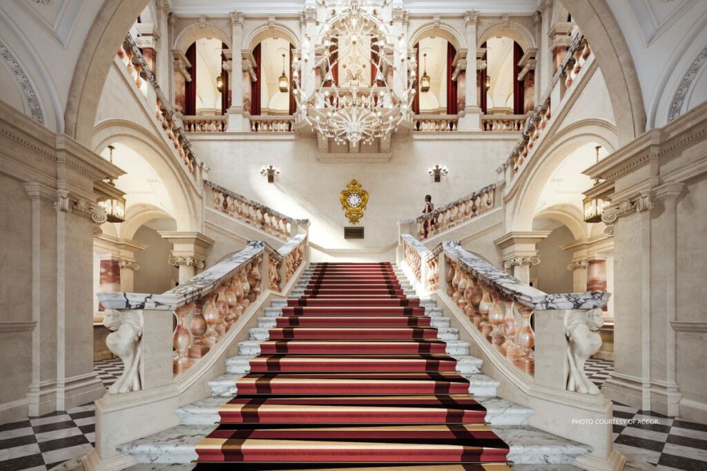 The OWO is home to the first Raffles hotel in the United Kingdom. This is an image of the Grand Staircase in Raffles London at The OWO. Photo courtesy of Accor.