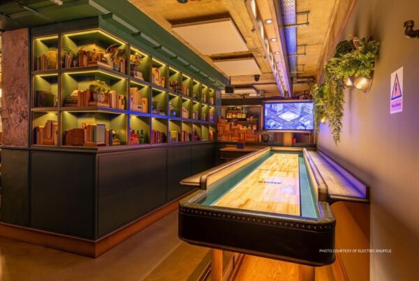 Electric Shuffle will open in New York City in Spring 2024. The company currently has locations in Austin, Dallas, London and Leeds. This is a photo of an electric shuffleboard in a room at one of the company's existing locations. Photo courtesy of Electric Shuffle.