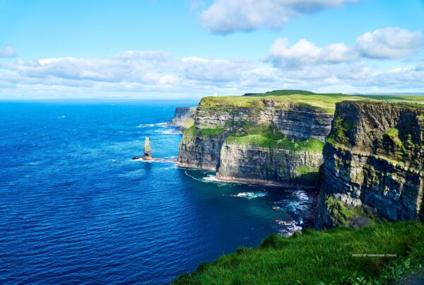 This is an image of the Cliffs of Moher, Ireland. Photo by naknaknak | Canva.