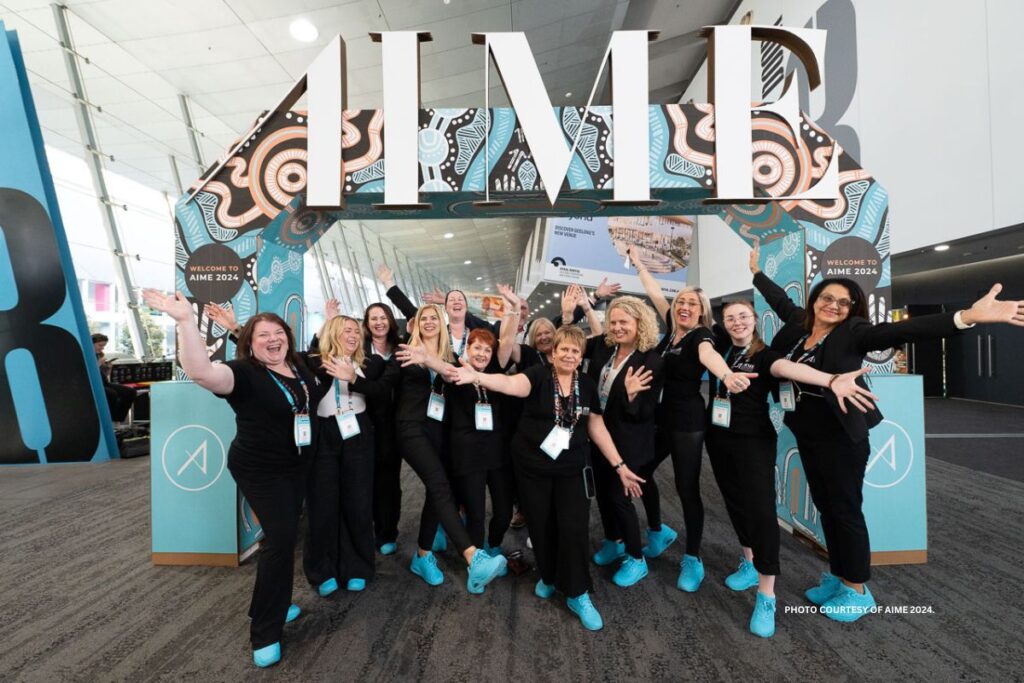 This is an image of AIME 2024 show management team led by Silke Calder, who is fourth from right. Photo courtesy of AIME 2024.