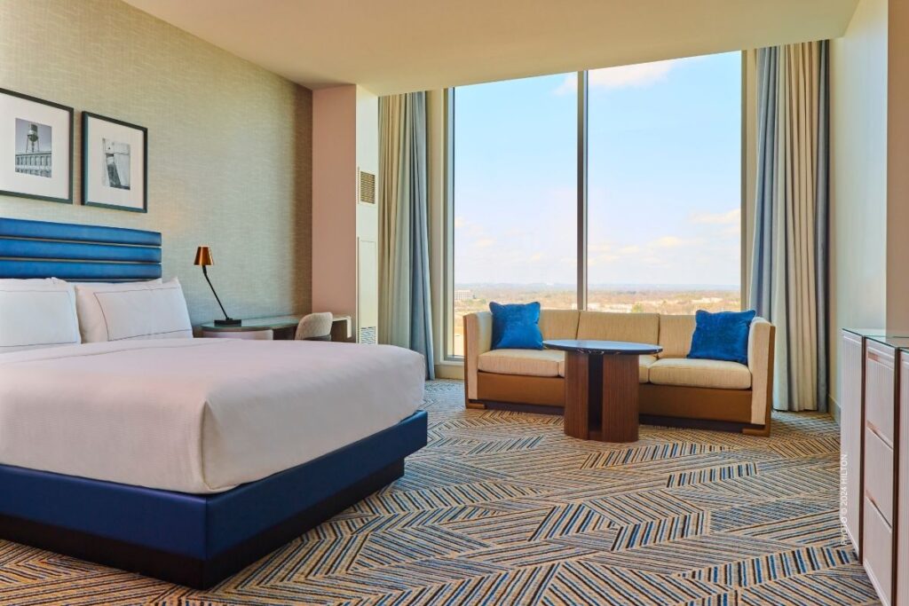This is an image of a guestroom at Hilton BNA Nashville Airport Terminal, which opened on March 8, 2024 in Nashville, Tennessee. Photo © 2024 Hilton.