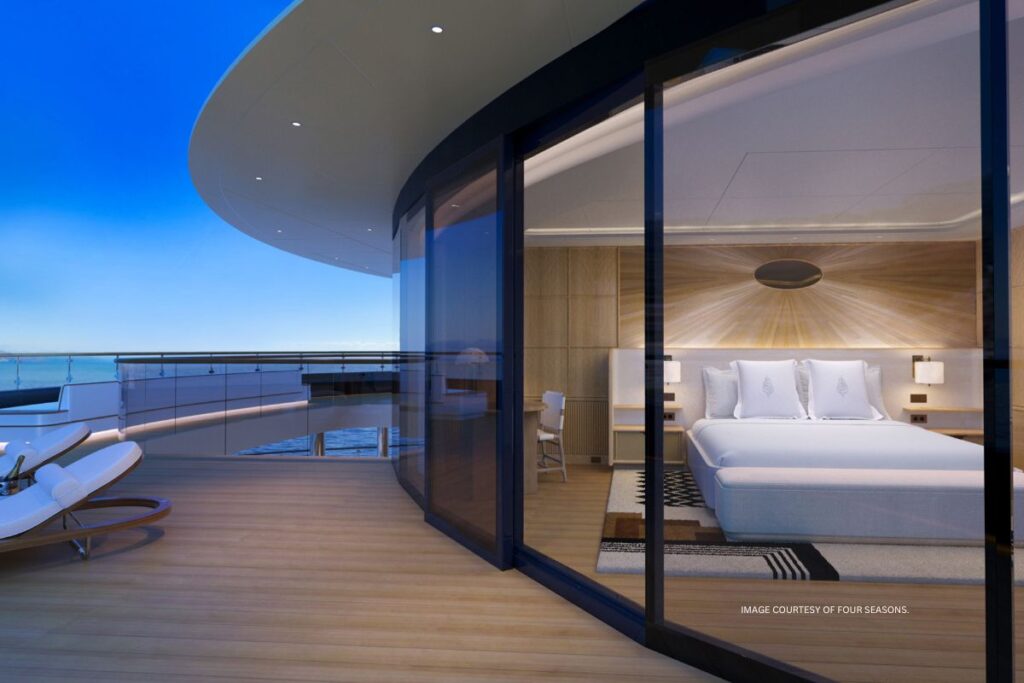 This is an image of the Loft Suite bedroom and its terrace aboard a Four Seasons Yacht. Image courtesy of Four Seasons.