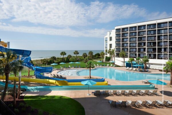 This is an image of some of water activities and poolscape at The Ellie Beach Resort Myrtle Beach, Tapestry Collection by Hilton. Photo courtesy of Ellie Beach Resort.