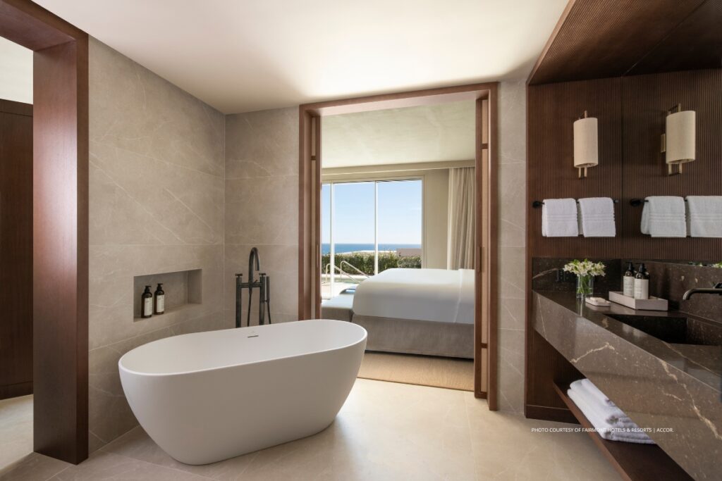 This is an image of a bathroom and bedroom in a Sea View King Suite with pool at Fairmont La Hacienda Costa del Sol, Spain. Photo courtesy of Fairmont Hotels & Resorts | Accor.