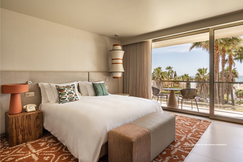 This is the photo of the interior of a Premium Room at Kimpton Atlântico Algarve. Photo courtesy of IHG Hotels & Resorts.