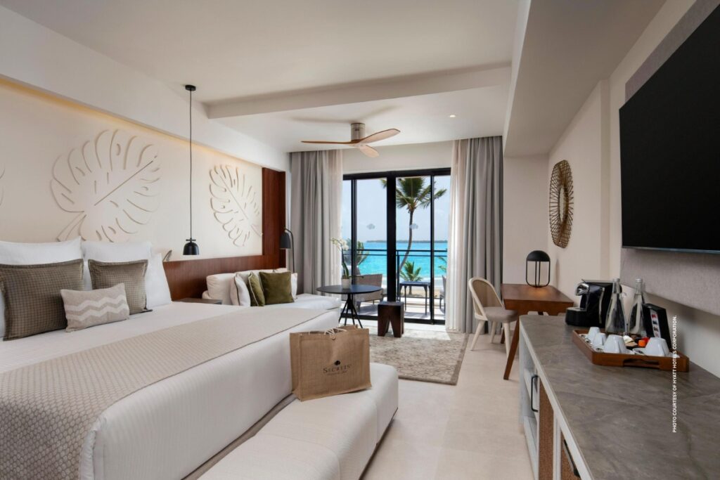 This image shows the interior of a King Bed Suite at Secrets Playa Esmeralda Resort & Spa, Dominican Republic. Photo courtesy of Hyatt Hotels Corporation.
