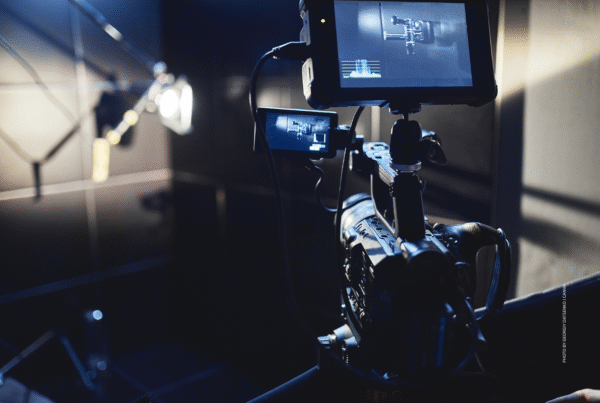 This is a stock image of a video camera in a broadcast studio. Photo by Georgiy Datsenko | Canva.