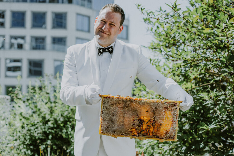 Bees are a core part of the environmental stewardship initiatives found in Fairmont hotels around the world. This image shows the "bee butler" at the Fairmont Waterfront in Vancouver, British Columbia. Photo courtesy of Accor.