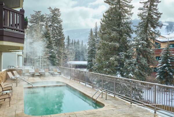 Austria Haus Hotel in Vail, Colorado, has joined the Destination by Hyatt portfolio. The image here shows the property's outdoor heated pool. Image courtesy of Hyatt.