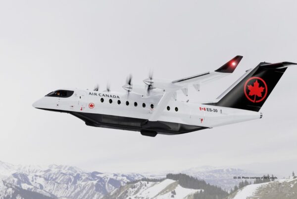 Electric regional aircraft have been purchased by Air Canada from Heart Aerospace. This image shows the ES-30 in Air Canada livery flying over mountains. The planes are expected to enter service in 2028. Photo courtesy of Air Canada.