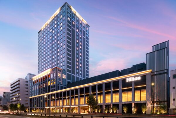 Hilton Hiroshima is now open. This image shows the front exterior of the 420-room property at night. Photo © Hilton 2022.