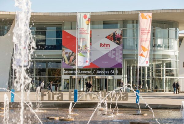 IBTM World 2022 will be held at Fira Barcelona, Spain. This is an image of the exterior of a building at Fira Barcelona with IBTM World signage. Photo is courtesy of IBTM World.