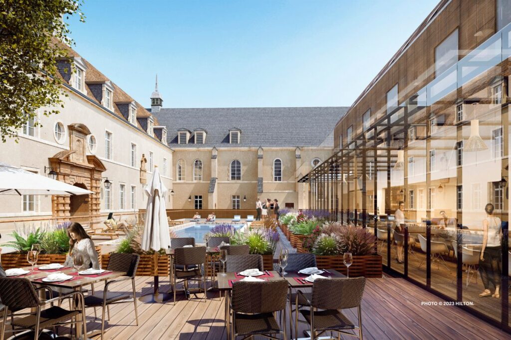 This is an image of the courtyard terrace at Sainte-Anne Hotel Dijon, Curio Collection by Hilton, which is opening summer 2023. Photo © 2023 Hilton.