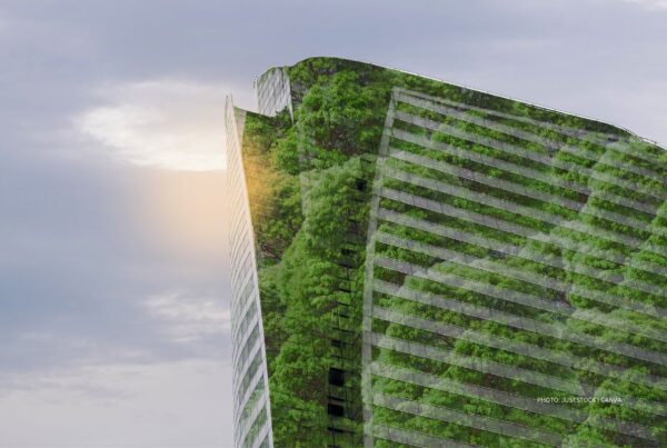 Global Hotel Alliance launched its Green Collection on March 23, 2023. This is a stock image of a building covered with green foliage. Photo by Juststock | Canva.