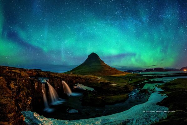 Iceland - This is an image of the Northern Lights in Kirkjufell, Iceland. Photo by tawatchaiprakobkit | Canva.