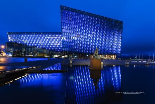 This is a stock image of the Reykjavik Opera House in Iceland. The image is used as art for a news item about Iceland Travel joining Ovation Global DMC. Photo by Przemysław Ceglarek | Canva.