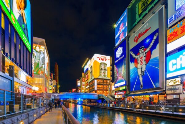 This is an image of the Dotonbori shopping district in Osaka, Japan. Photo is by Avigator Photographer | Canva.