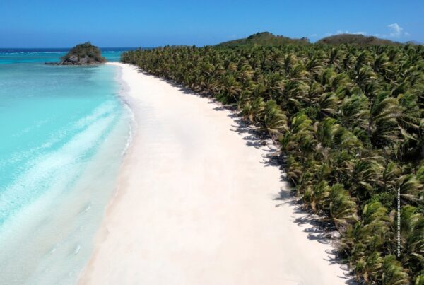 This image shows a beach on Nacula Island, Fiji, which will be home to a One&Only resort and private homes, opening in 2029. Photo courtesy of Kerzner International.