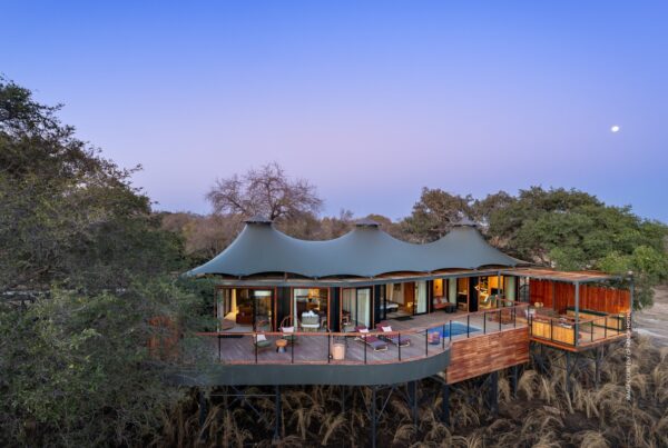 This is an image of Anantara Kafue River Tented Camp, opening in April 2026, at sunset. Photo courtesy of Minor Hotels.