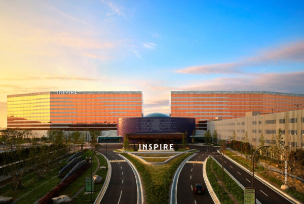 This is an image of the exterior of INSPIRE Entertainment Resort in South Korea at dawn. Photo © 2025 Hilton.