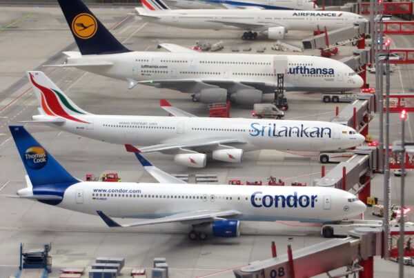 This is a stock image of jets from a variety of international carriers at an airport's gates. Photo by gunthersimmermacher | Canva.