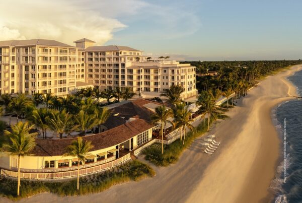 This image shows the beach and exterior of Naples Beach Club, A Four Seasons Resort in Naples, Florida. Photo courtesy of Four Seasons.