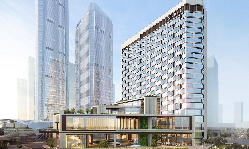 Luxury brand properties being opened by Hilton in 2023 include the Conrad Shenzhen in China. This image  is a rendering of the exterior of the  property. Image © Hilton 2022.